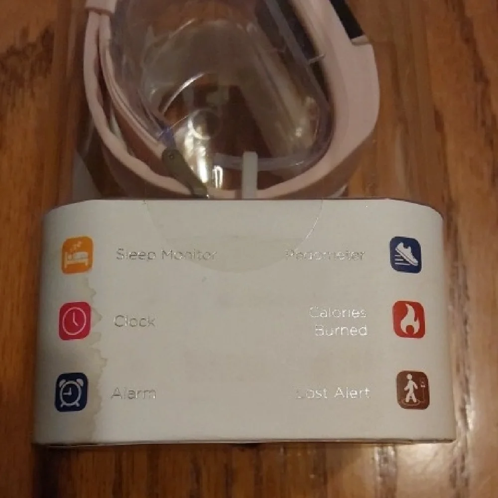 Activity Tracker in Pink and White